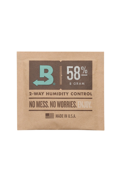 A close-up of the Boveda Humidity Control Pack for Dry Herbs - 58%, showing its packaging with a blue logo and percentage display.