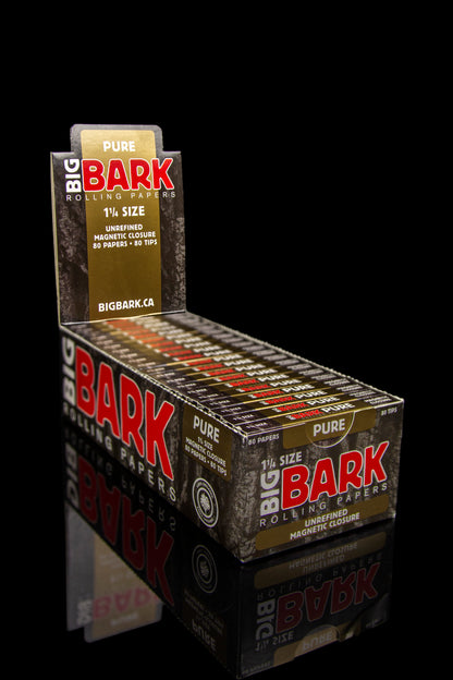 Stack of “Big Bark” rolling paper booklets, featuring red and black branding, and indicating 80 papers and 80 tips per pack.
