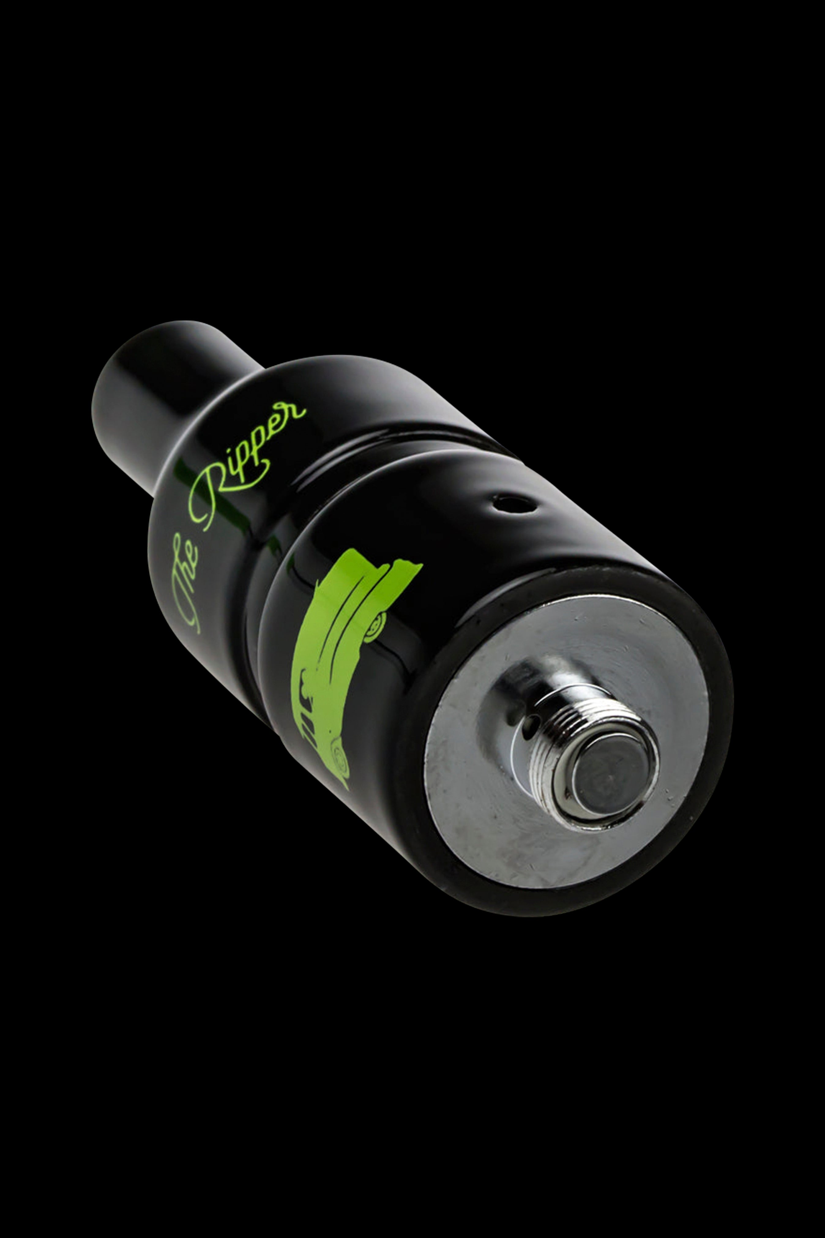 Black and silver cannabis concentrate vaporizer attachment with green branding.