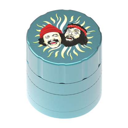 Front view of the Cheech & Chong 40th Anniversary Grinder, featuring a silver metallic finish and stylized, radiating lines.