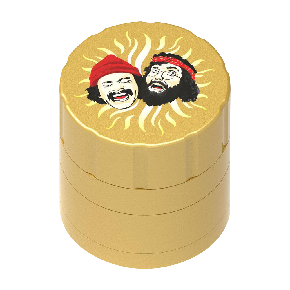 A top-down view of the Cheech & Chong 40th Anniversary Grinder, showcasing a golden, multi-tiered cylindrical design.