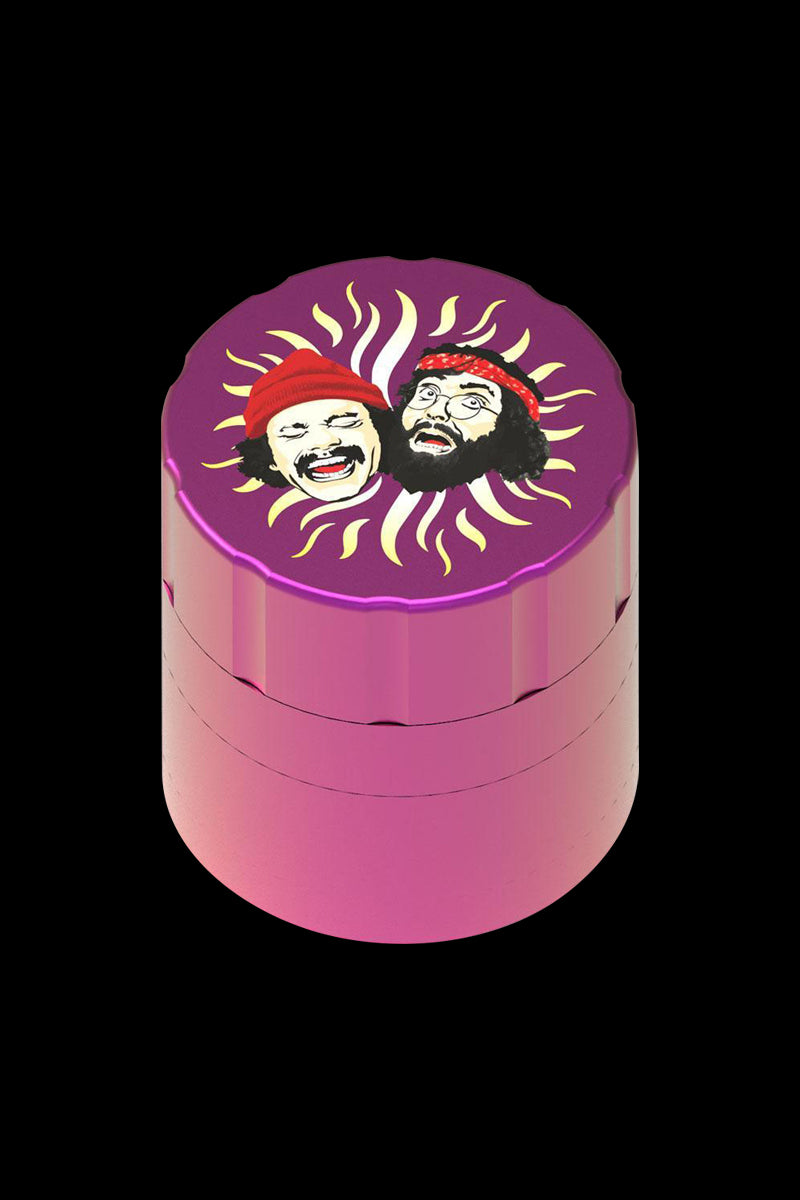 Front view of the Cheech & Chong 40th Anniversary Grinder, a cylindrical metal grinder with a colorful design.