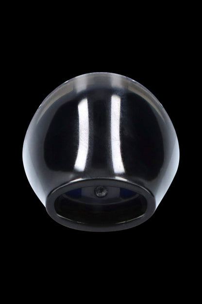 Black glass cannabis water pipe against a dark background.