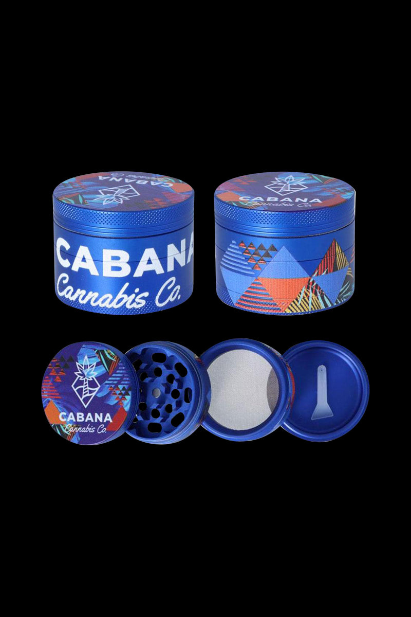 Front view of the Cabana Cannabis Co. 3 Stage Grinder - The Dawn, showcasing its circular shape and detailed metallic finish.