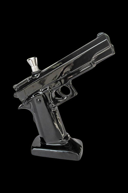 A front view of the Ceramic .45 Pistol Shaped Water Pipe, showcasing its glossy black ceramic finish and realistic pistol form.