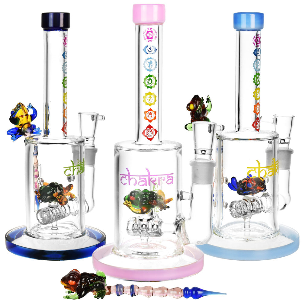Front view of the Chakra Frog Water Pipe with Stir Tool, featuring a clear glass pipe with a colorful frog accent and accompanying stir tool.