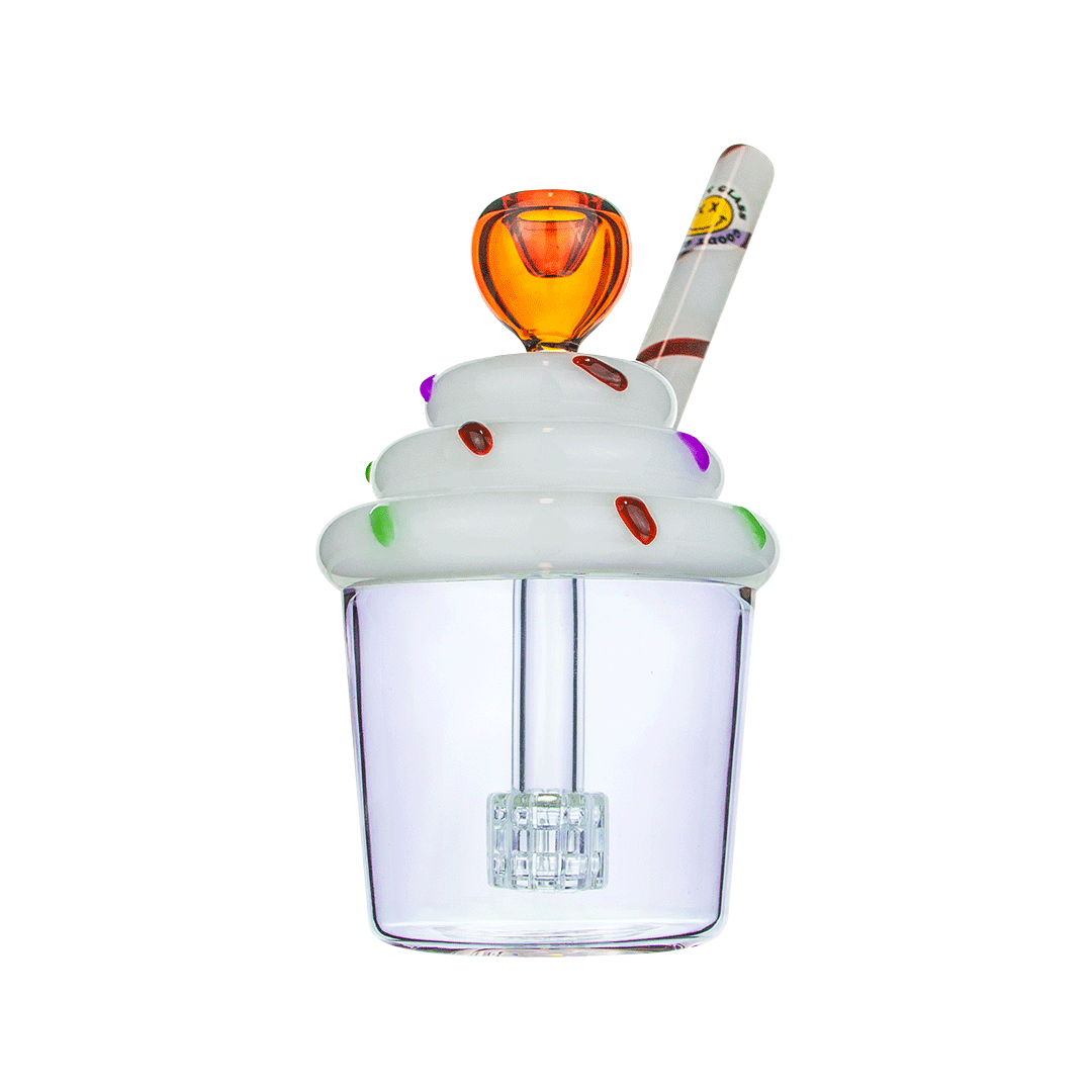Front view of the Goody Cupcake Bubbler, a clear glass bubbler resembling a frosted cupcake with a colorful, swirled topper.