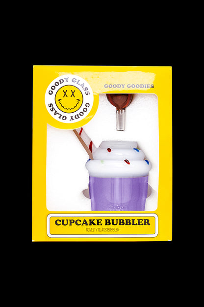 A studio shot of the Goody Cupcake Bubbler, displaying a whimsical, colorful glass piece against a plain white backdrop.
