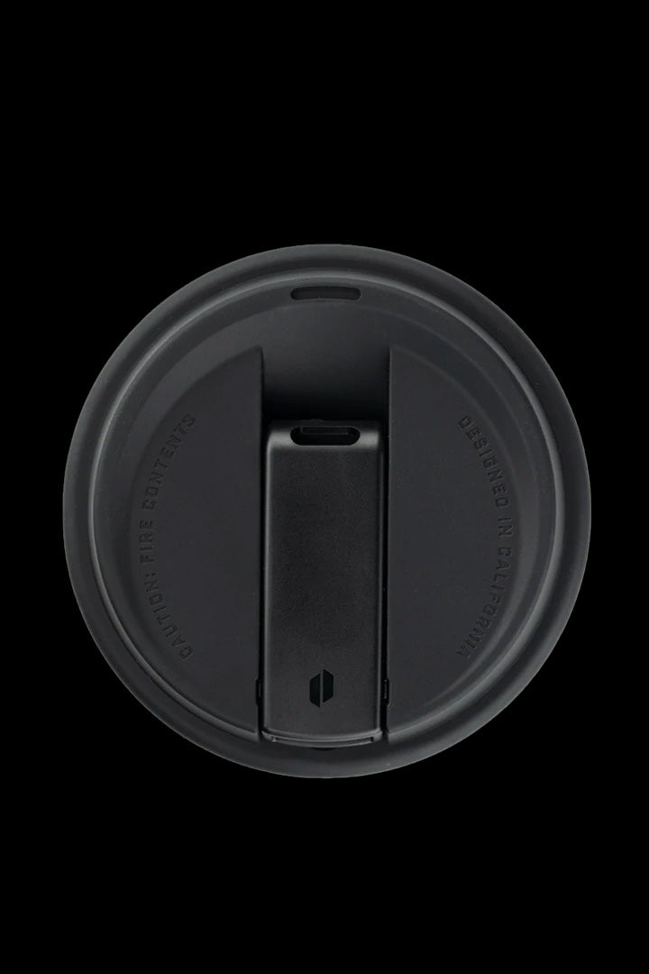 Black silicone cannabis container lid with text.