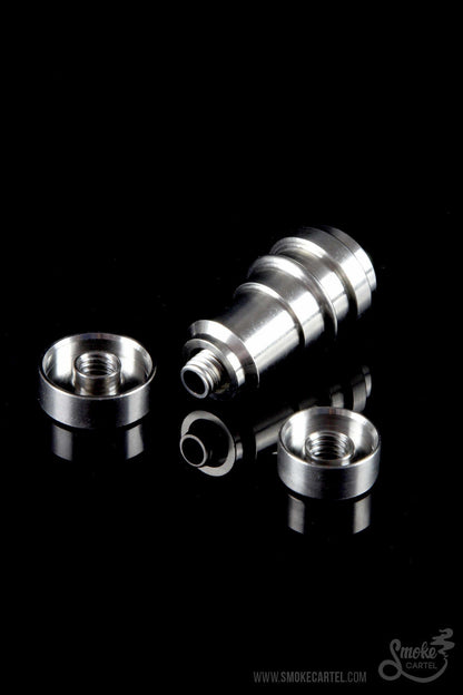 Silver dab rig components against a black background.