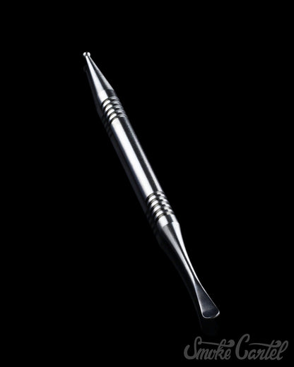 A close-up of the 4" Titanium Grade 2 Dual End Dabber Tool, angled against a dark background highlighting its metallic finish.