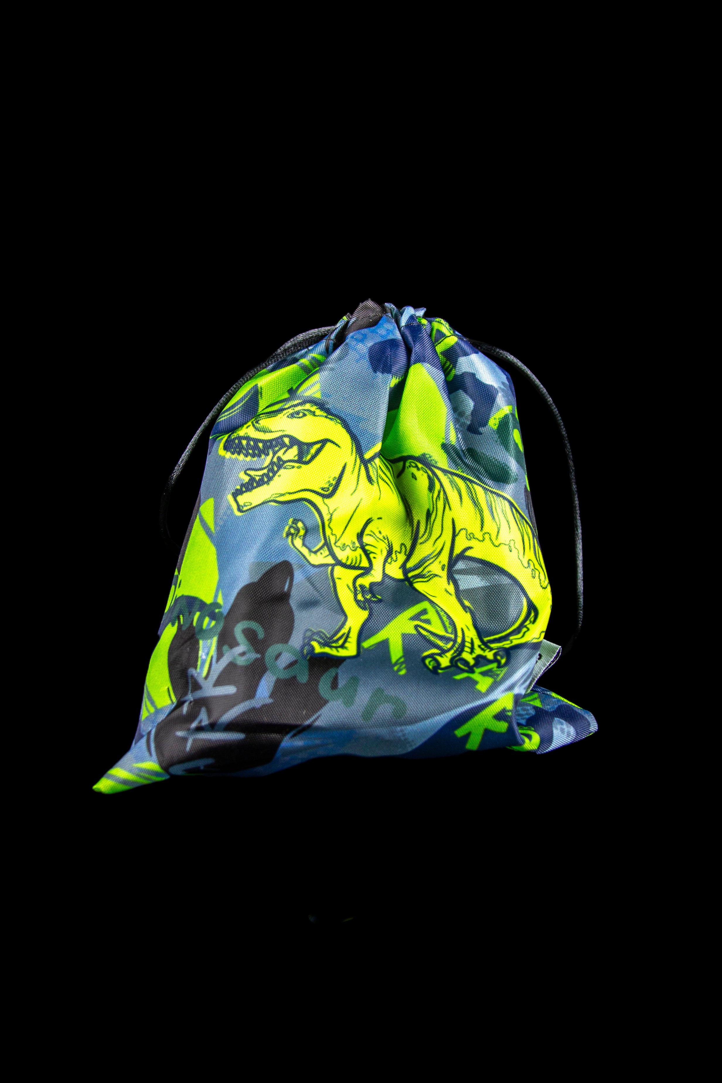Neon green and blue drawstring bag with a dinosaur and cannabis leaf pattern.