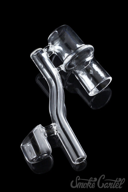 A slightly angled view of the Dropdown Quartz Reclaimer, showing its clear glass construction and curved design.