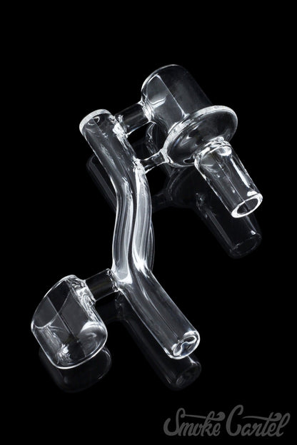 A studio shot of the Dropdown Quartz Reclaimer, displaying its clear glass construction and curved design against a black backdrop.