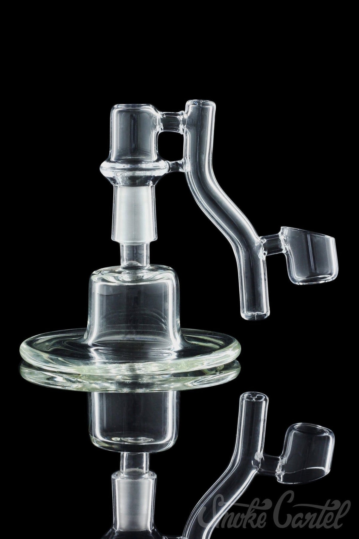 A studio shot of the Dropdown Quartz Reclaimer, displaying its transparent glass construction and curved design against a dark background.