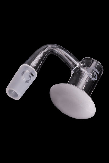 Clear glass carb cap for dabbing cannabis concentrates, isolated on a black background.