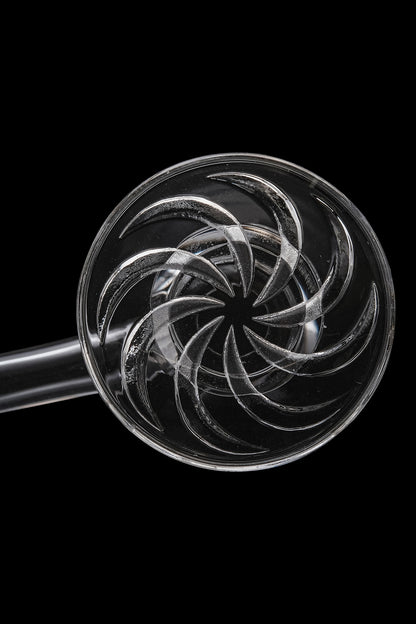 Clear glass cannabis oil rig with intricate spiral percolator.