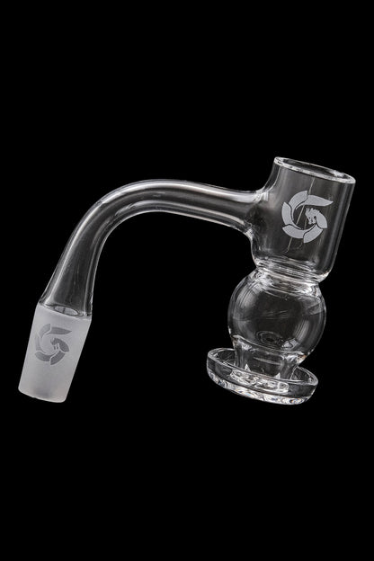 Clear glass dab rig with a bubbler design and branded logo, isolated on a black background.