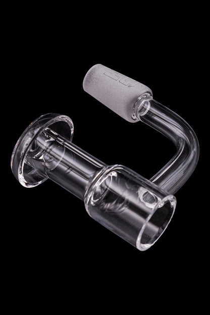 Clear glass dab rig banger with frosted joint.