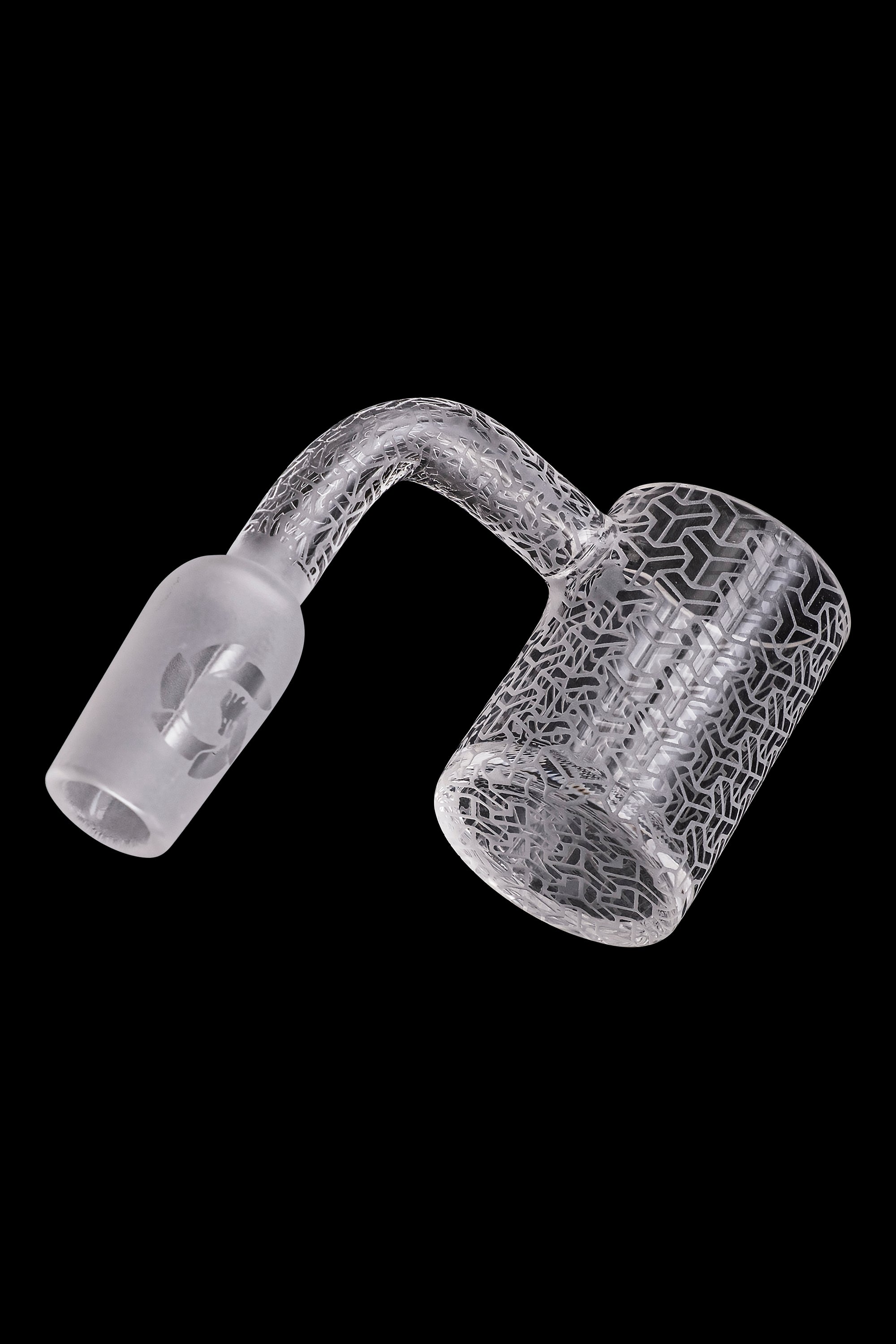 Frosted glass cannabis dab rig with intricate geometric patterns.