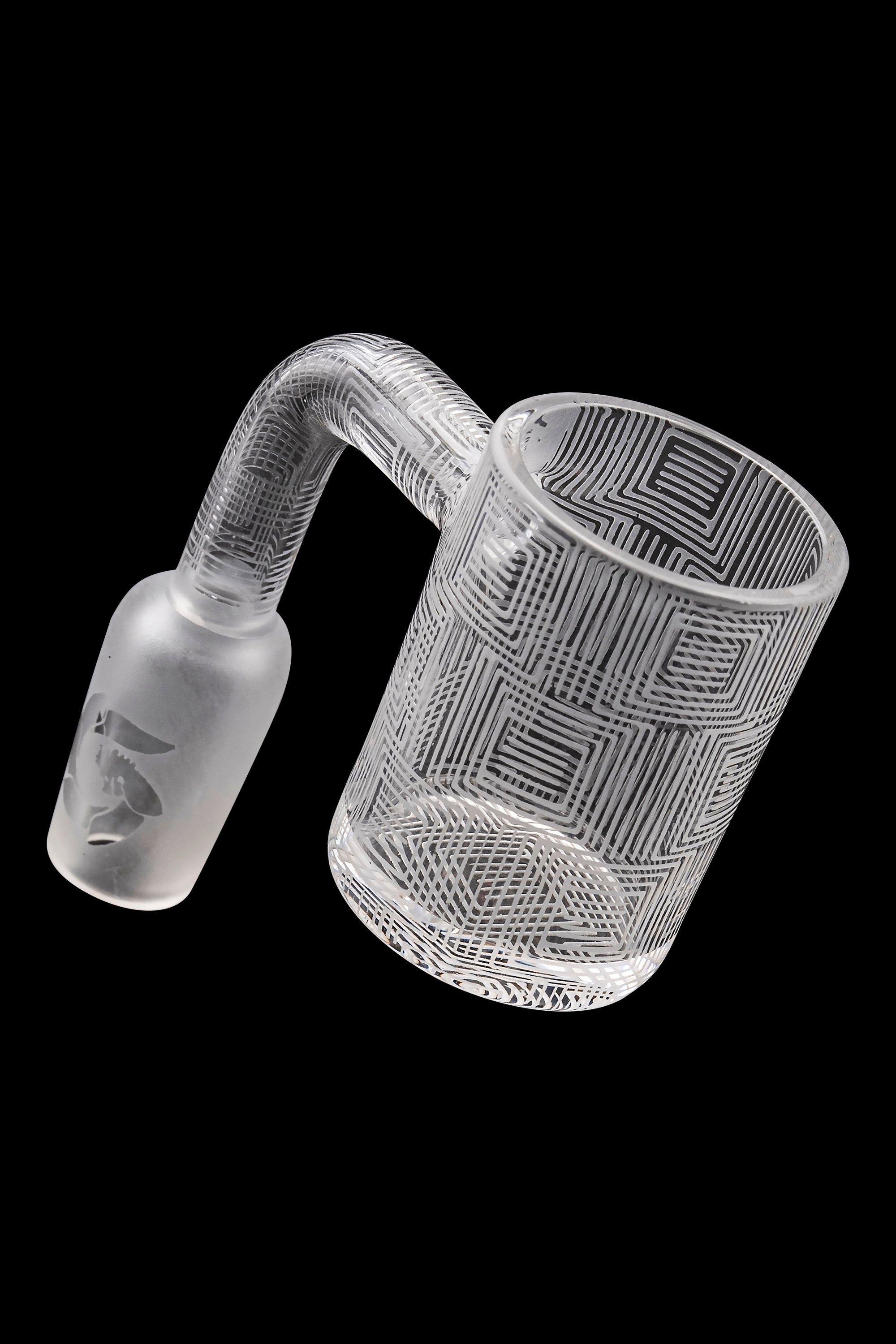 Frosted glass dab rig with geometric pattern and visible mouthpiece.