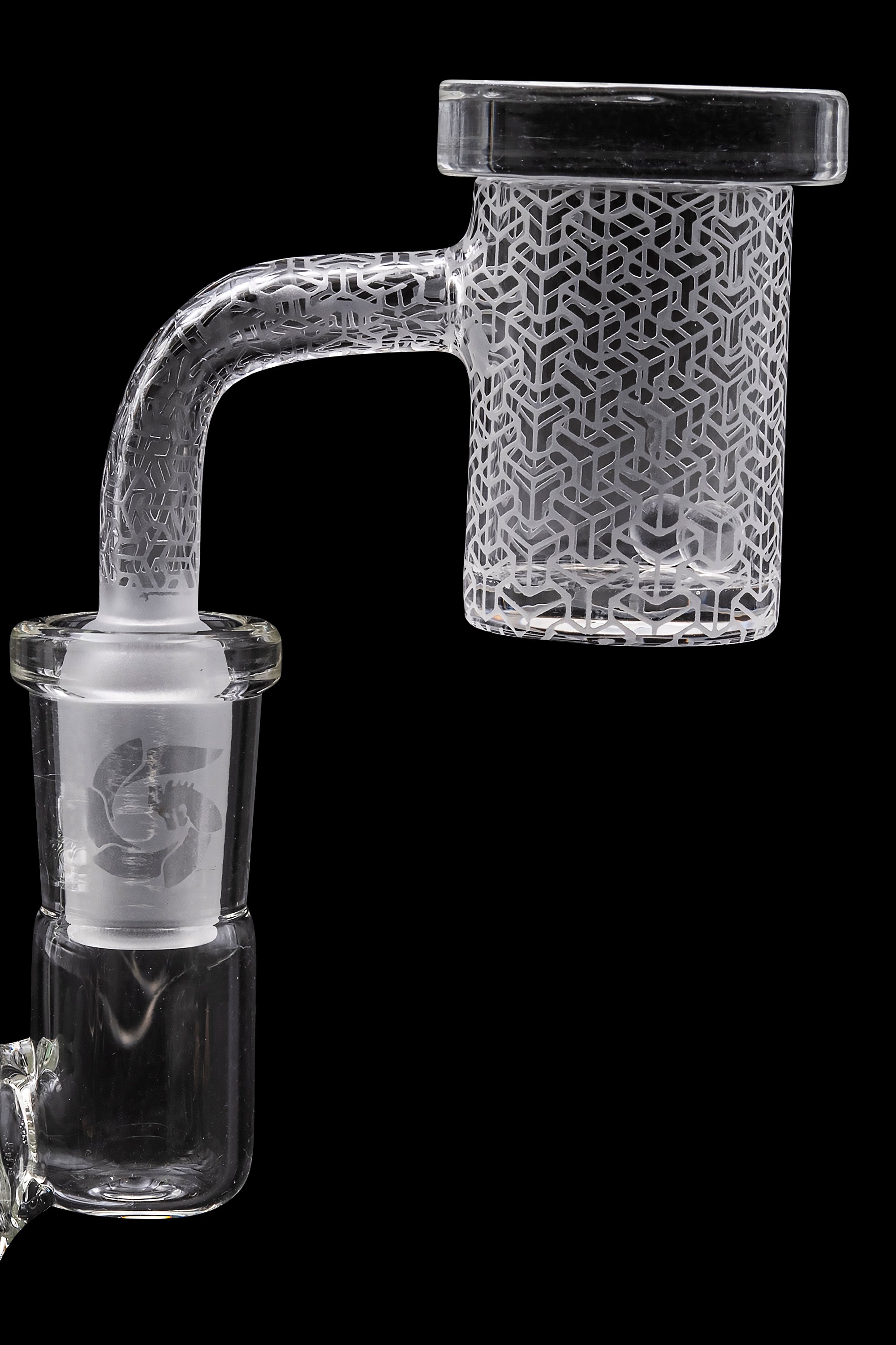 Clear glass bubbler water pipe with intricate geometric etching, isolated on a black background.
