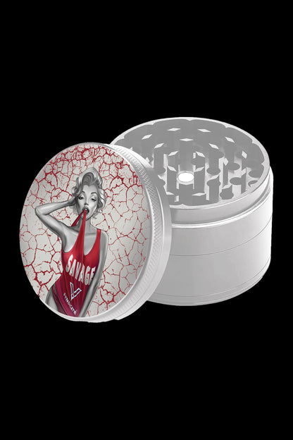 Silver four-piece grinder with a graphic of a pin-up girl and "SAVAGE" text on the lid.