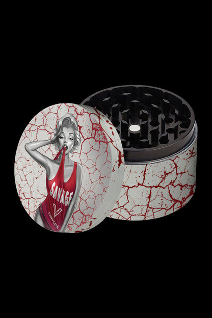 Cannabis grinder with a cracked white and red design featuring a pin-up girl illustration.
