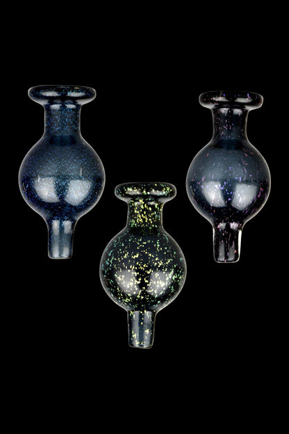 A close-up, angled view showcases the Shiny Dicro Disco Ball Glass Carb Cap with a shimmering, reflective surface.