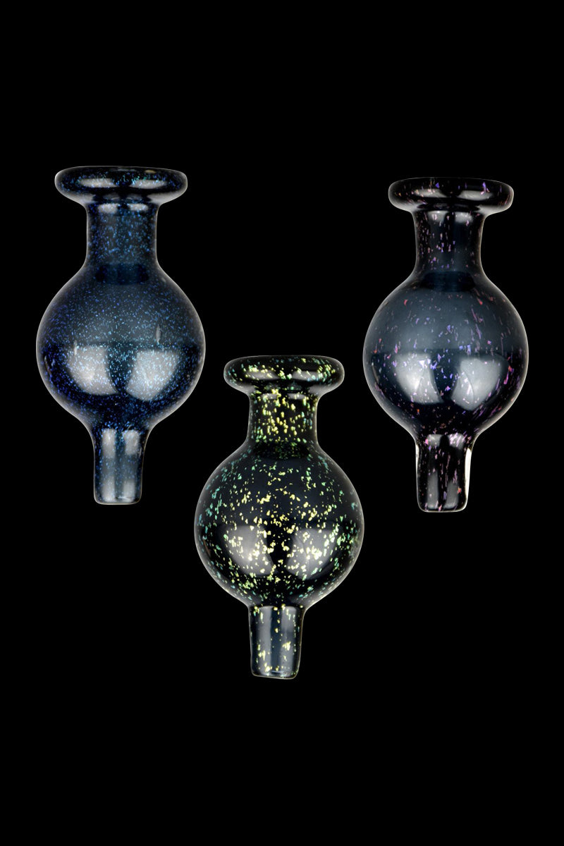 A close-up, angled view showcases the Shiny Dicro Disco Ball Glass Carb Cap with a shimmering, reflective surface.