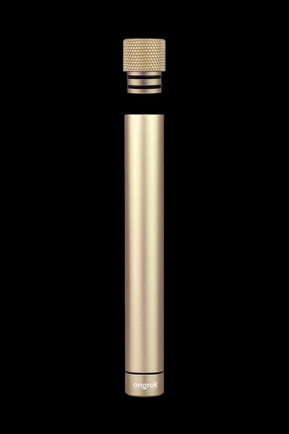 Gold cannabis oil applicator with textured grip.