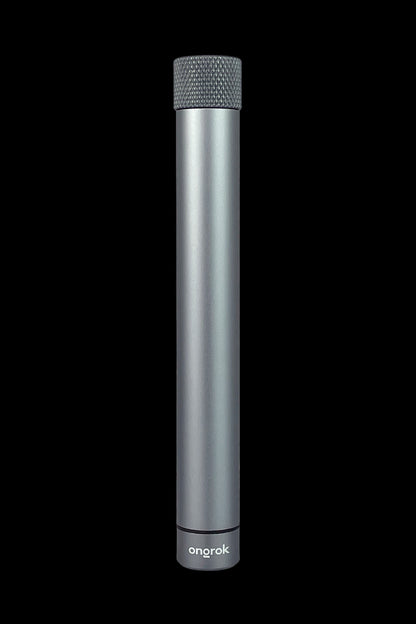 Sleek, cylindrical Onrok vaporizer pen against a black background.