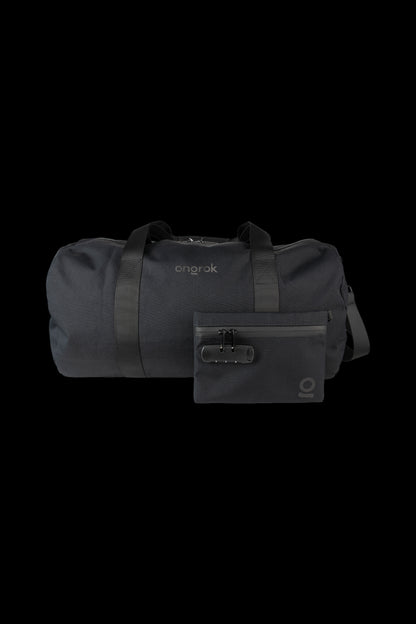 Black cannabis accessory travel bag with a lockable smell-proof pouch attached.