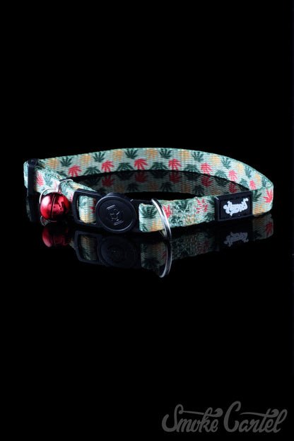 Close-up of the HeadyPet Cat Collar, displaying a vibrant patterned design against a dark background.