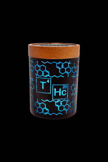 A cylindrical cannabis storage container with a glowing blue THC molecular structure design on a black background, topped with a wooden lid.