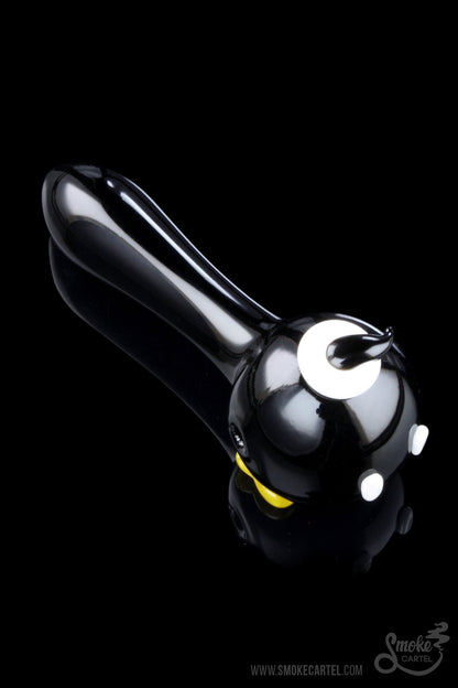 An angled studio shot of the Empire Glassworks Time Bomb Spoon, featuring its detailed glasswork and unique shape.