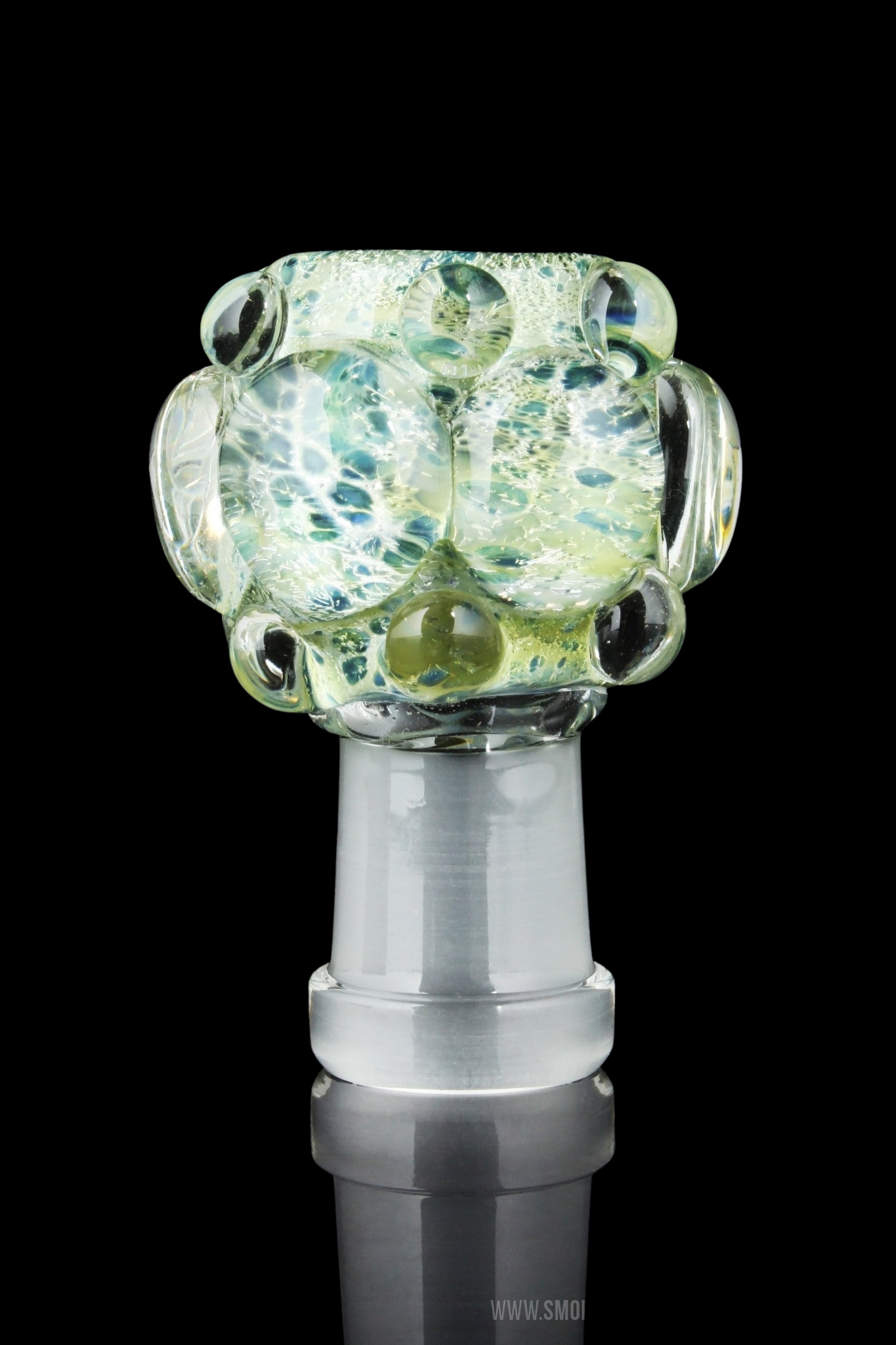 A close-up, angled view of the Empire Glassworks Colored Dichroic Dome with Bumps, showcasing its textured, colorful glass surface.