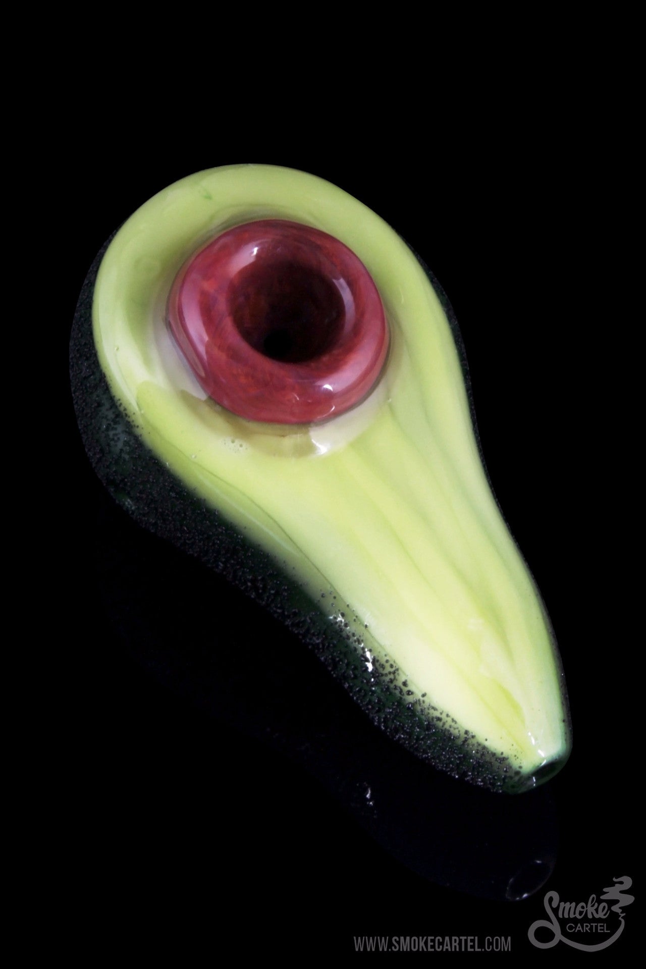 A close-up studio shot of the Empire Glassworks "Avocadope" Hand Pipe, shaped like an avocado with a green gradient.