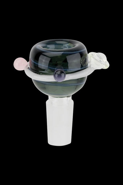 A close-up, angled view of the Empire Glassworks Galactic UV Reactive & Glow Bowl, showcasing its colorful glass design.