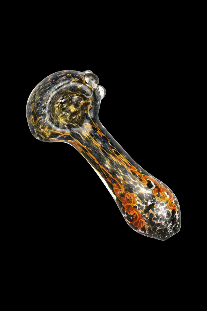 A side view of the Fritted Squiggle Spoon Glass Pipe, showcasing its colorful, speckled glass design.