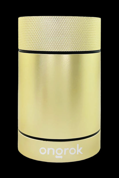 Gold cannabis storage container with “onorok” logo.