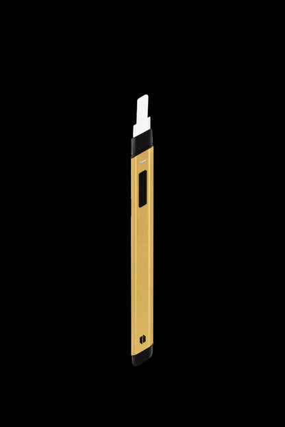 Gold cannabis vape pen against a black background.