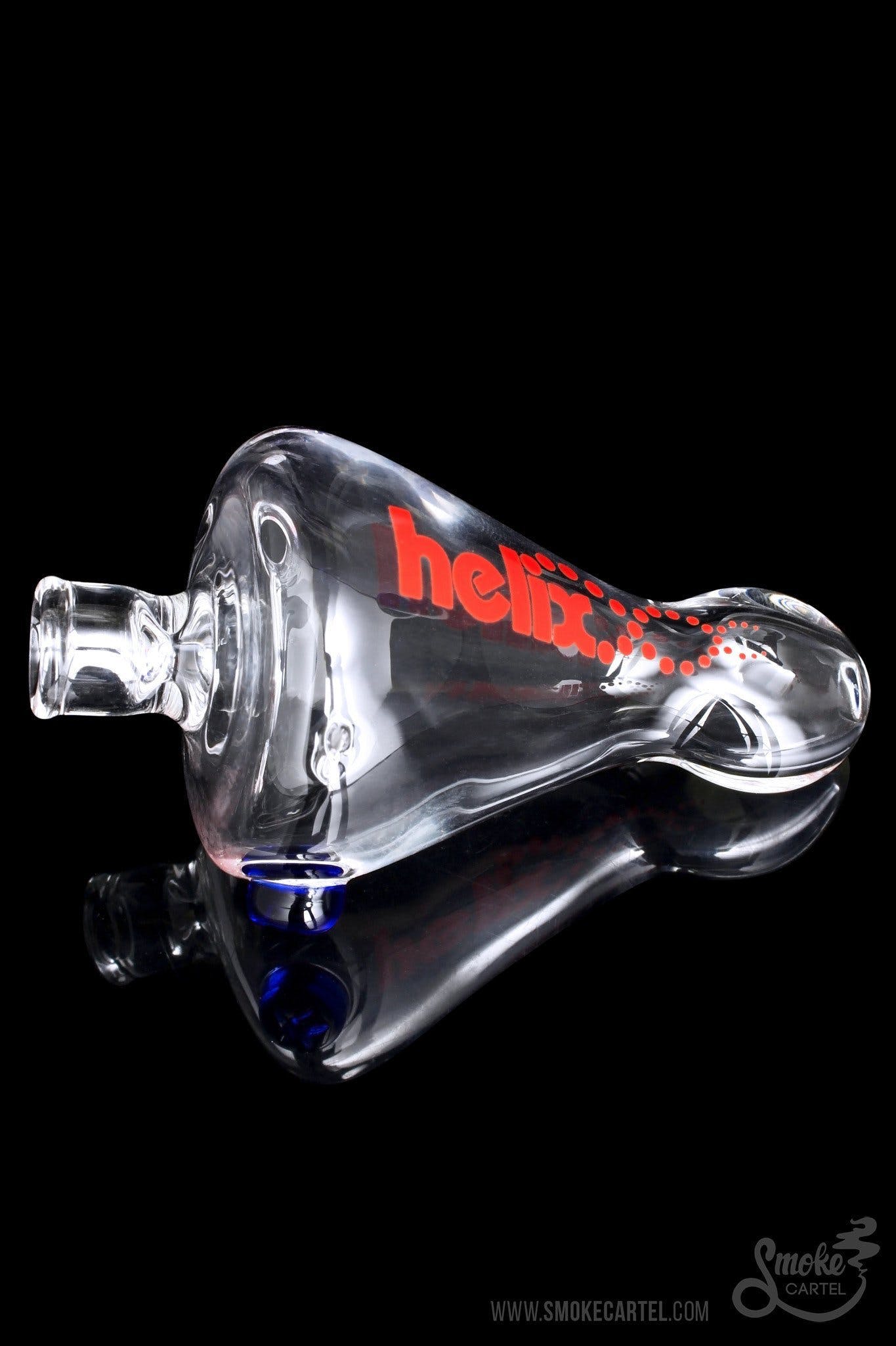 A detailed side view of the GRAV® Helix Taster Chillum, showcasing its compact size and sleek, modern design against a dark backdrop.