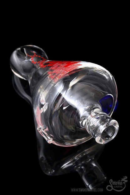 The GRAV® Helix Taster Chillum is pictured in a three-quarter view against a dark background, highlighting its glass construction.