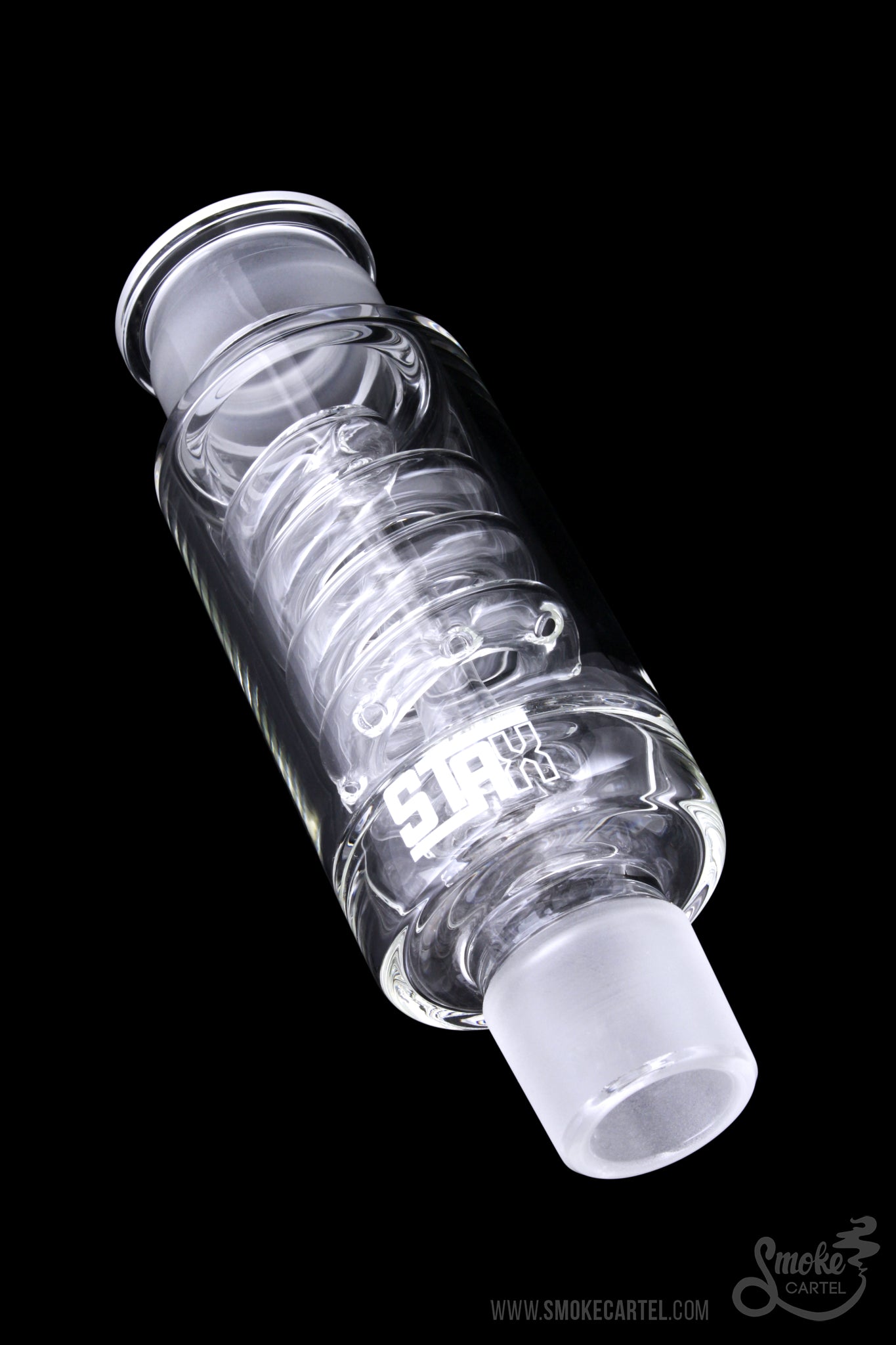 A three-quarter view of the GRAV® STAX Coil Perc, showcasing its clear glass construction and intricate coil design.