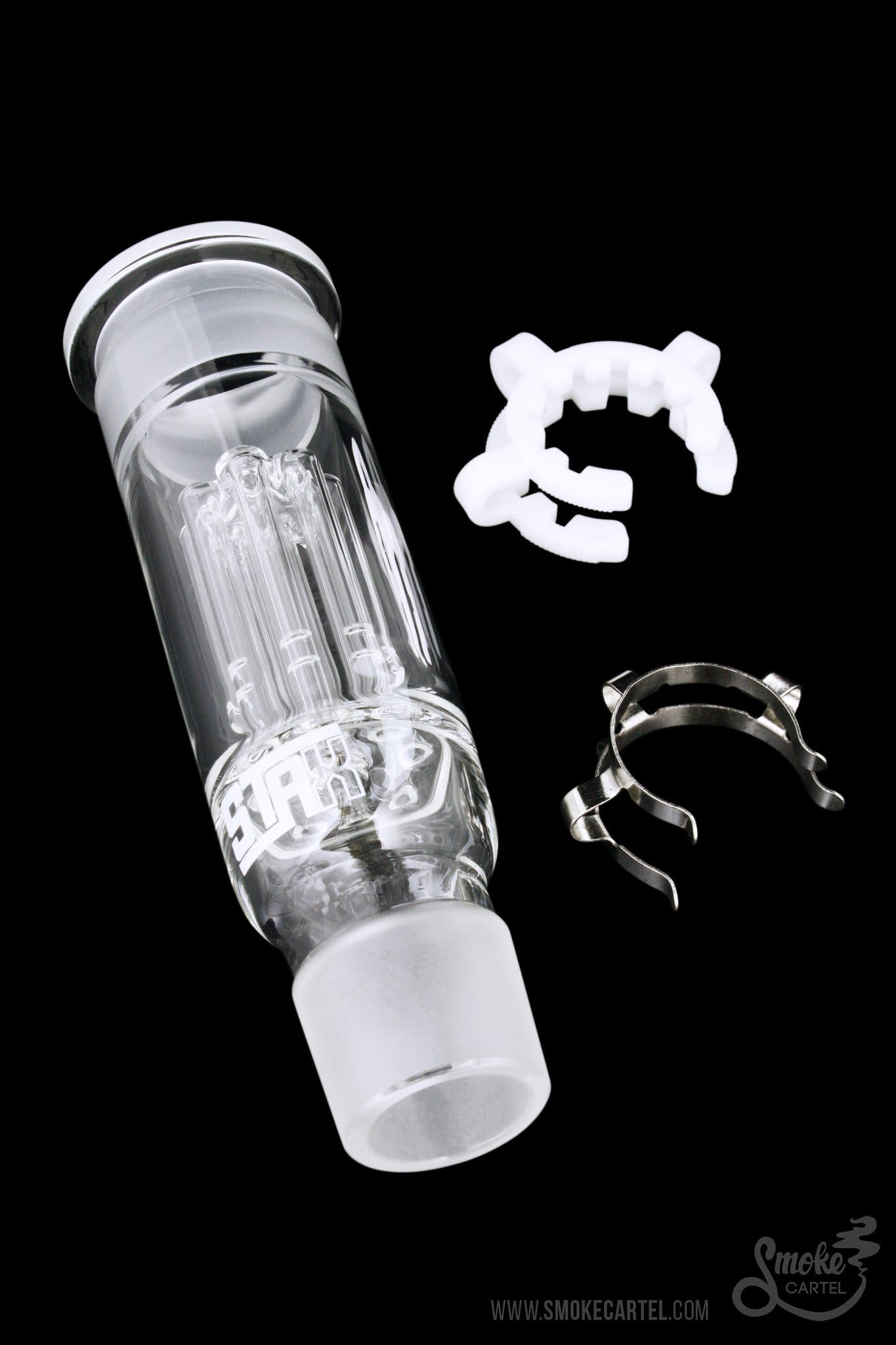Glass bubbler with diffusion perc, alongside replacement silicone and metal gaskets, isolated on a black background.