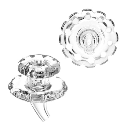 Close-up view of the Glass Gear Carb Cap, a clear glass cap with a gear-like design, shown against a white backdrop.