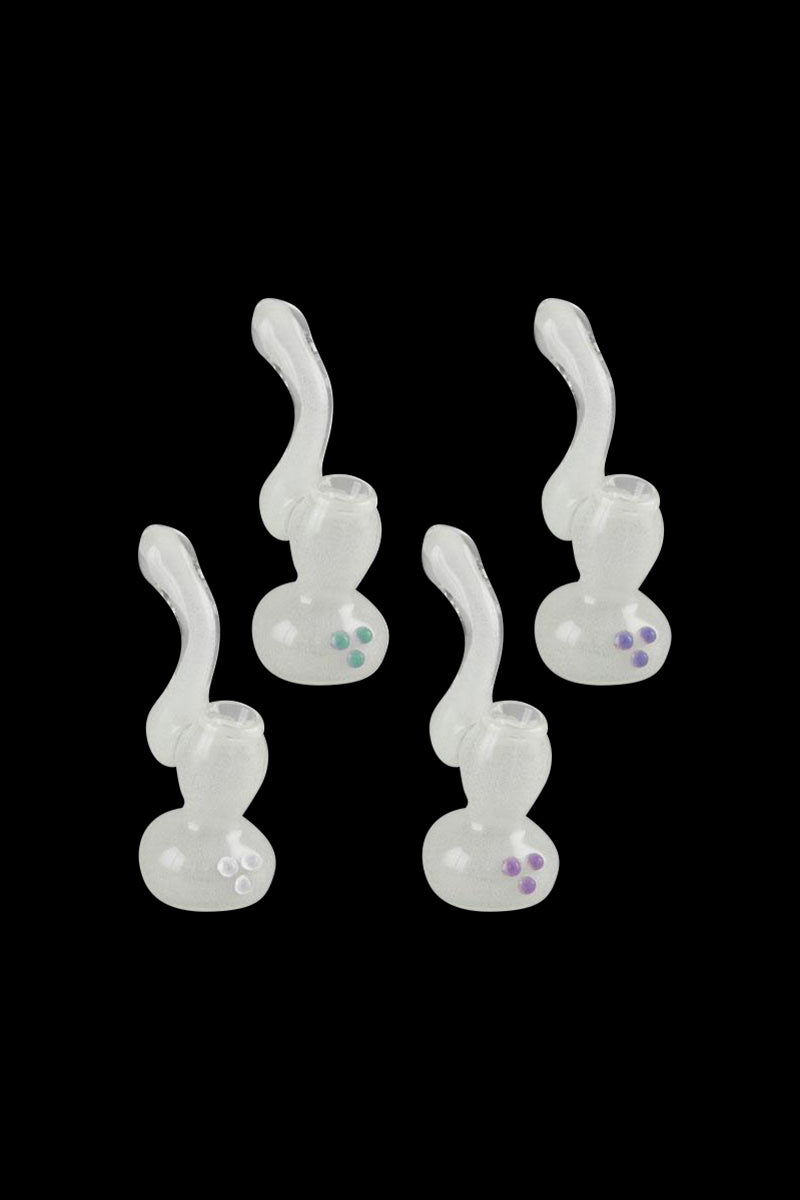 Front view of the Glow in the Dark Glass Bubbler, showcasing its clear glass construction and simple curved design against a black background.