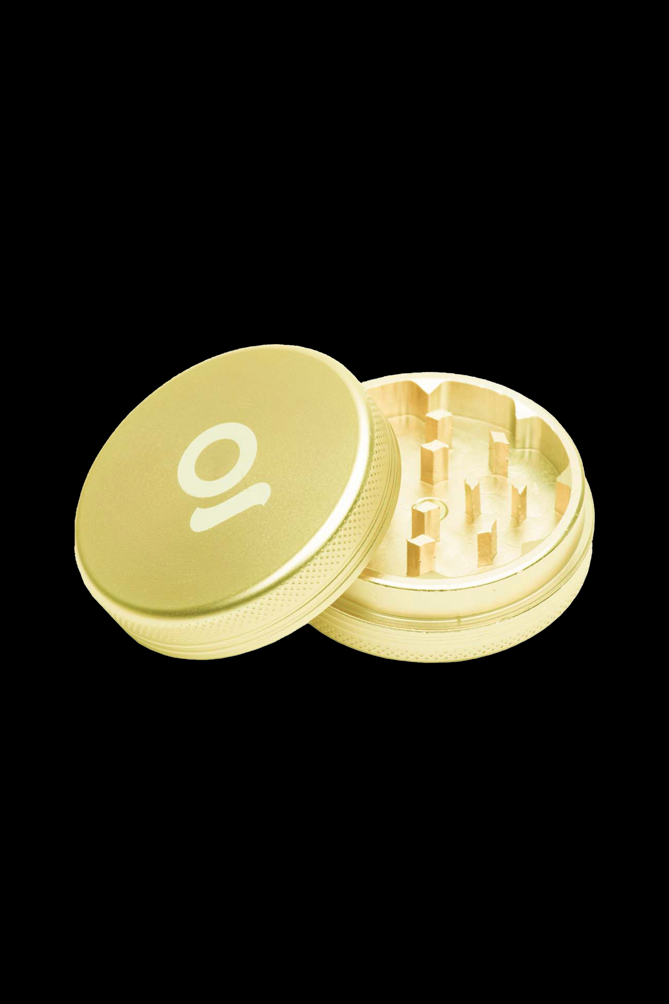 Gold cannabis grinder with open lid revealing the grinding teeth.