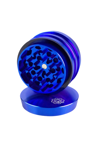 A tiered view of the Pulsar 2 Aluminum 4pc Grinder, showcasing its blue metallic finish and circular design.